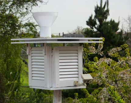 Thermo/Hygro in radiation shield, Rain Gauge on top Thermo/Hygro and Rain Gauge
